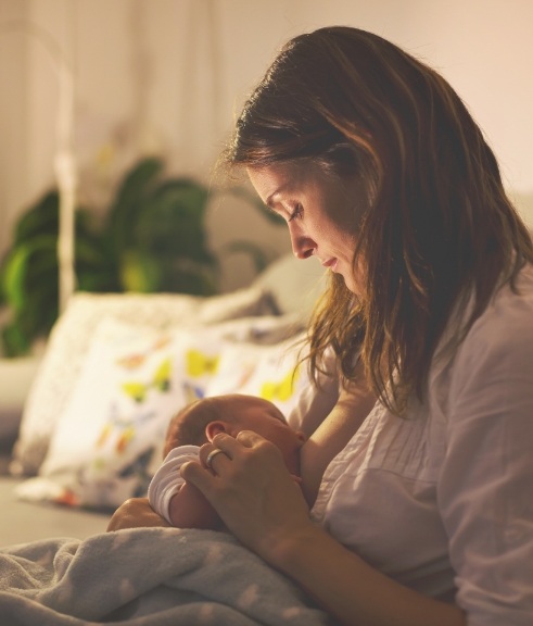 Mother breastfeeding her baby